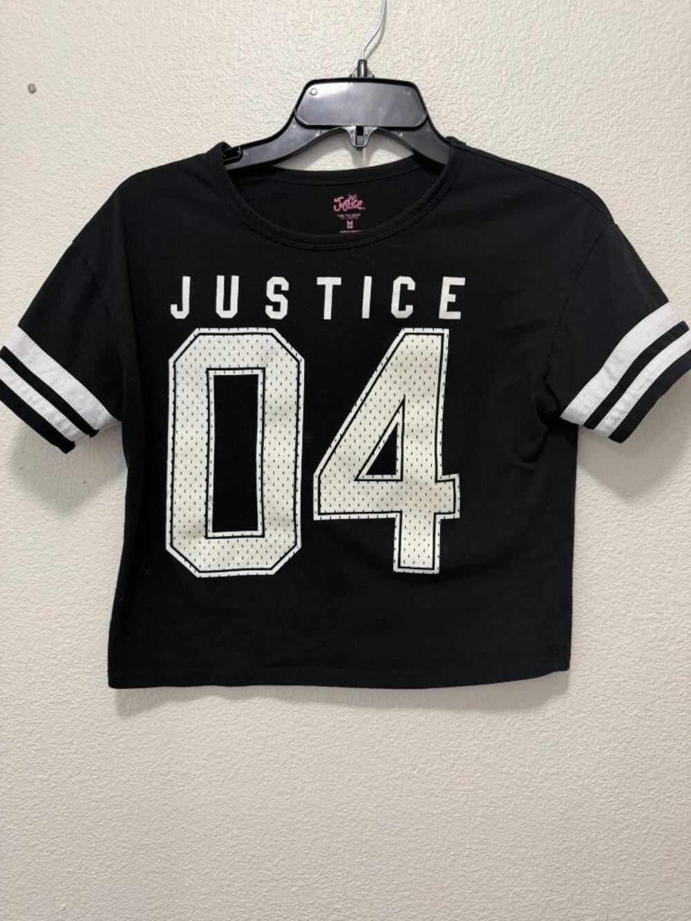 Justice black cropped short sleeve t-shirt, iridescent logo and numbers, Medium